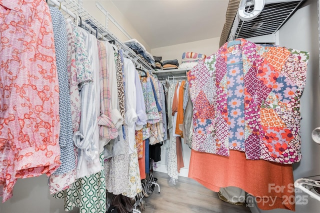 1300 Reece Rd Unit 206, Charlotte, NC 28209 - walk in closet featuring wood finished floors