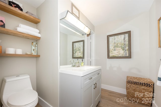 1300 Reece Rd Unit 206, Charlotte, NC 28209 - bathroom with wood finished floors and vanity