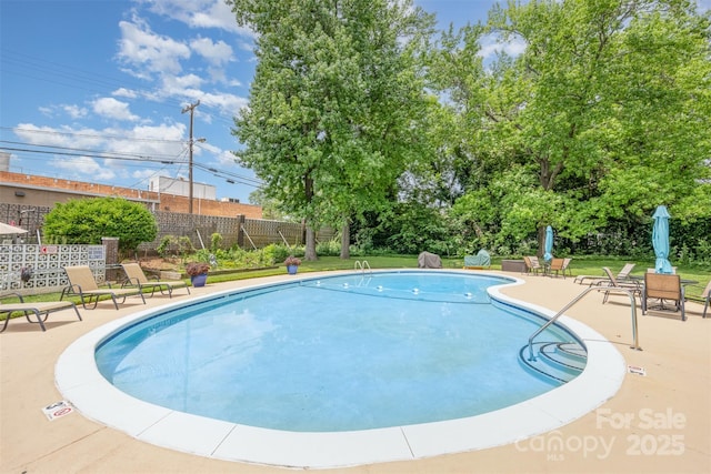 1300 Reece Rd Unit 206, Charlotte, NC 28209 - community pool featuring a patio