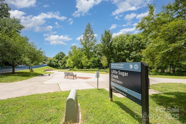 1300 Reece Rd Unit 206, Charlotte, NC 28209 - surrounding community featuring a lawn