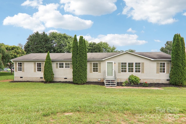 18 Sweet Briar Path Way, Hendersonville, NC 28792 - view of front facade featuring crawl space, a front lawn, and a shingled roof