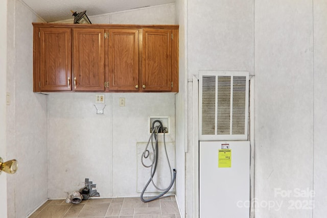 18 Sweet Briar Path Way, Hendersonville, NC 28792 - washroom with a heating unit, cabinet space, and washer hookup