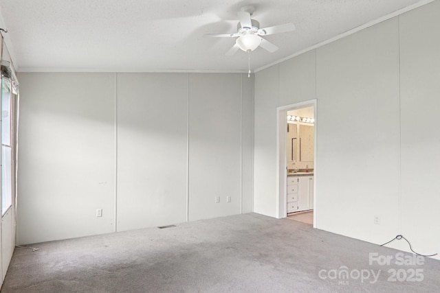 18 Sweet Briar Path Way, Hendersonville, NC 28792 - empty room featuring ceiling fan, carpet flooring, and ornamental molding