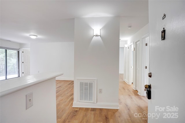4806 Spring Lake Dr Unit D, Charlotte, NC 28212 - corridor featuring light wood-style flooring and baseboards