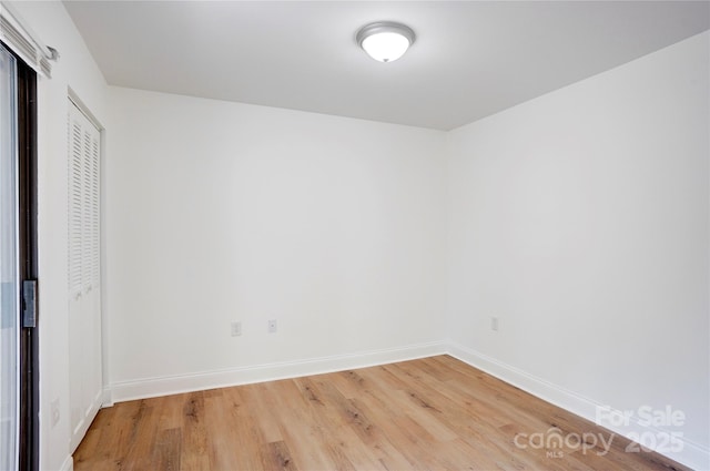4806 Spring Lake Dr Unit D, Charlotte, NC 28212 - unfurnished bedroom with wood finished floors and a closet