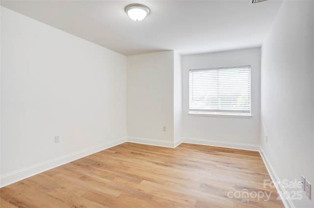 4806 Spring Lake Dr Unit D, Charlotte, NC 28212 - empty room featuring light wood finished floors and baseboards