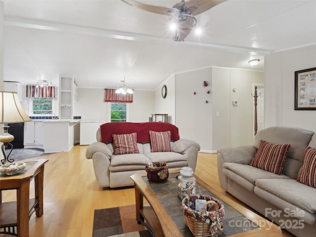 275 Bulldog Ln, Green Mountain, NC 28740 - living room featuring light wood-style floors, ceiling fan, and a chandelier