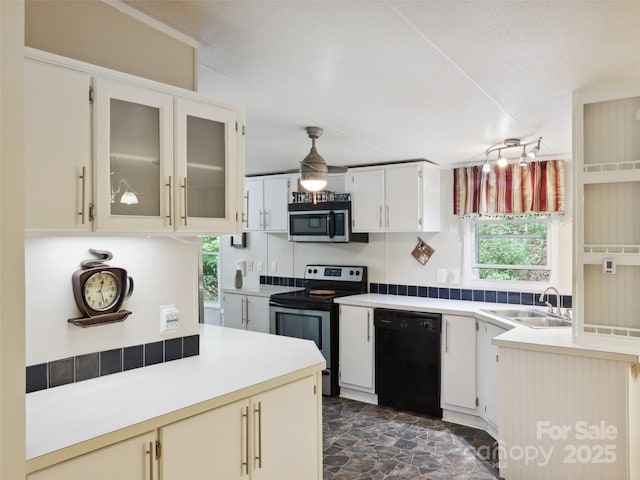 275 Bulldog Ln, Green Mountain, NC 28740 - kitchen featuring dishwasher, stainless steel microwave, range with electric cooktop, healthy amount of natural light, and a textured ceiling