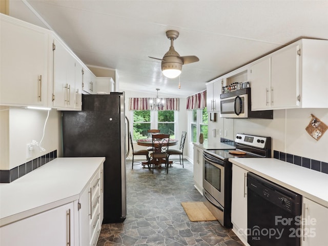275 Bulldog Ln, Green Mountain, NC 28740 - kitchen featuring appliances with stainless steel finishes, stone flooring, white cabinetry, and light countertops