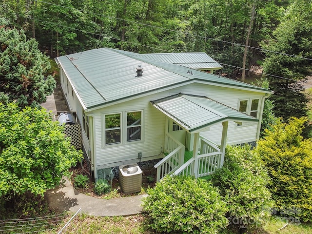 275 Bulldog Ln, Green Mountain, NC 28740 - back of house with a metal roof, stairs, and a view of trees