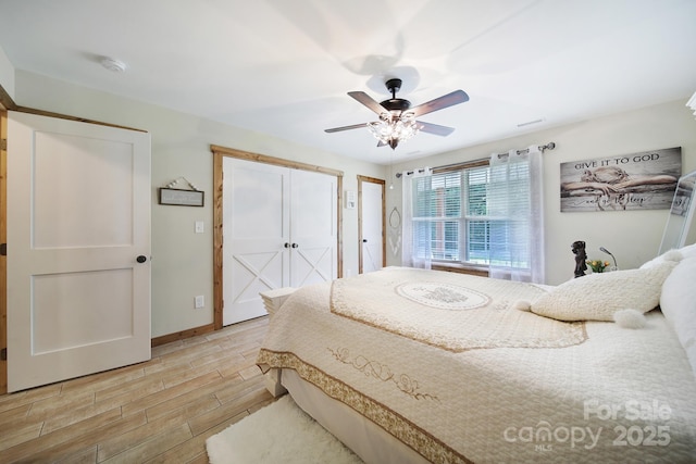 4592 Reid Rd, Edgemoor, SC 29712 - bedroom featuring wood tiled floors and a ceiling fan
