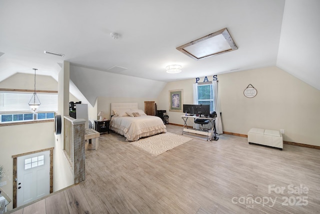 4592 Reid Rd, Edgemoor, SC 29712 - bedroom featuring attic access, lofted ceiling, and wood finished floors