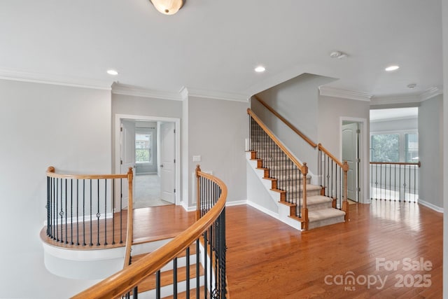 11335 Wescott Hill Dr, Huntersville, NC 28078 - staircase featuring wood finished floors, crown molding, and recessed lighting