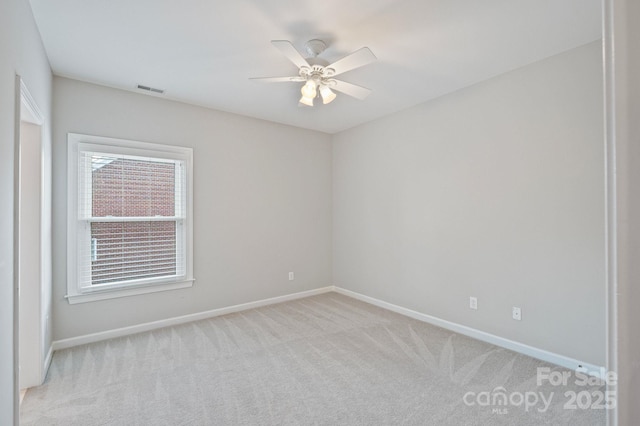 11335 Wescott Hill Dr, Huntersville, NC 28078 - spare room with light carpet and a ceiling fan