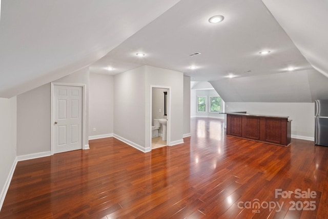 11335 Wescott Hill Dr, Huntersville, NC 28078 - additional living space with vaulted ceiling, dark wood-type flooring, and recessed lighting