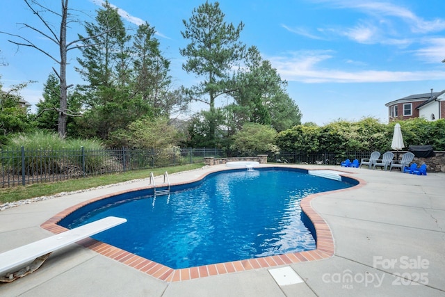 11335 Wescott Hill Dr, Huntersville, NC 28078 - view of swimming pool with a diving board and a patio