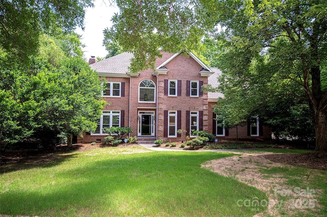 10408 Hadleigh Pl, Charlotte, NC 28210 - colonial-style house featuring a front lawn, brick siding, and a chimney
