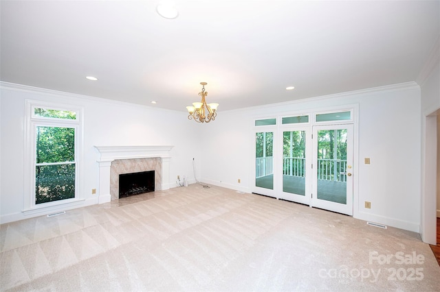 10408 Hadleigh Pl, Charlotte, NC 28210 - unfurnished living room featuring ornamental molding, carpet, a high end fireplace, a chandelier, and recessed lighting
