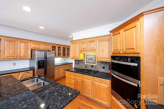 10408 Hadleigh Pl, Charlotte, NC 28210 - kitchen featuring black appliances, light wood finished floors, crown molding, dark stone counters, and backsplash