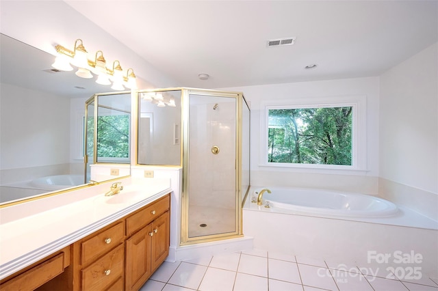 10408 Hadleigh Pl, Charlotte, NC 28210 - bathroom with vanity, a garden tub, a shower stall, and tile patterned floors