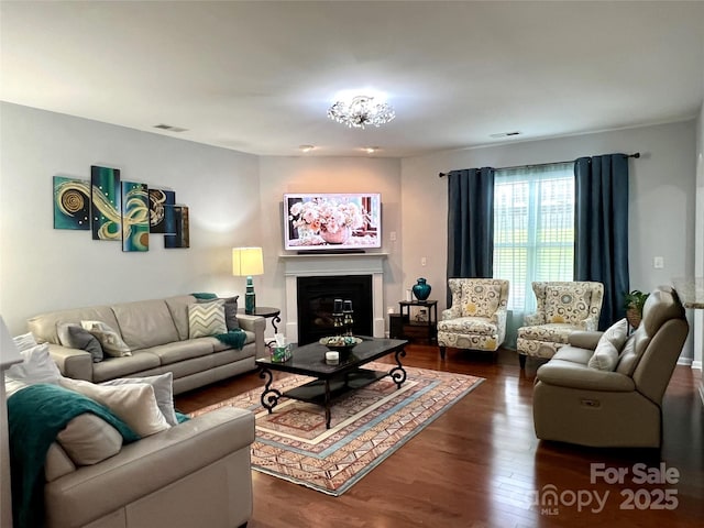 11511 Wilson Mill Ln, Pineville, NC 28134 - living room with dark wood-style flooring and a glass covered fireplace