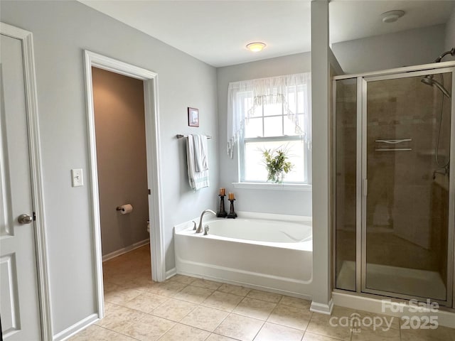 11511 Wilson Mill Ln, Pineville, NC 28134 - bathroom with a garden tub, tile patterned flooring, and a stall shower
