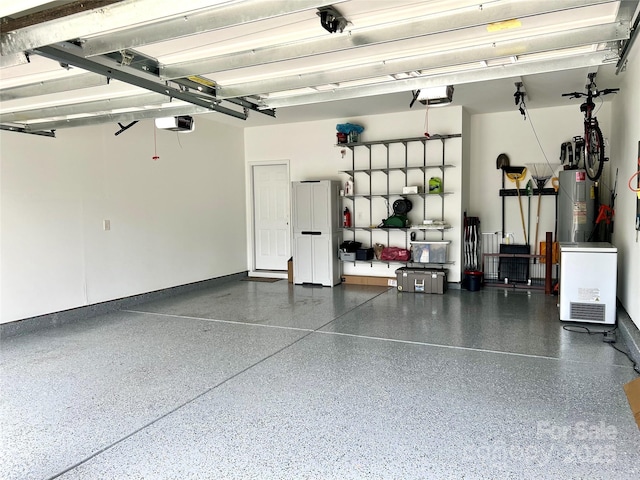 11511 Wilson Mill Ln, Pineville, NC 28134 - garage featuring a garage door opener and electric water heater