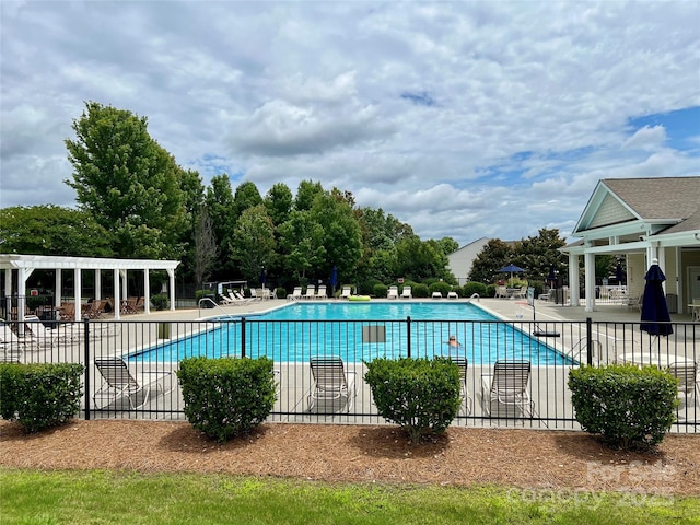 11511 Wilson Mill Ln, Pineville, NC 28134 - community pool with a patio area and a pergola