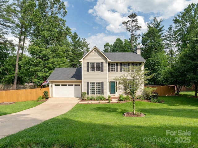 502 Windsor Forest Ct, Fletcher, NC 28732 - colonial home featuring a garage, a chimney, and driveway