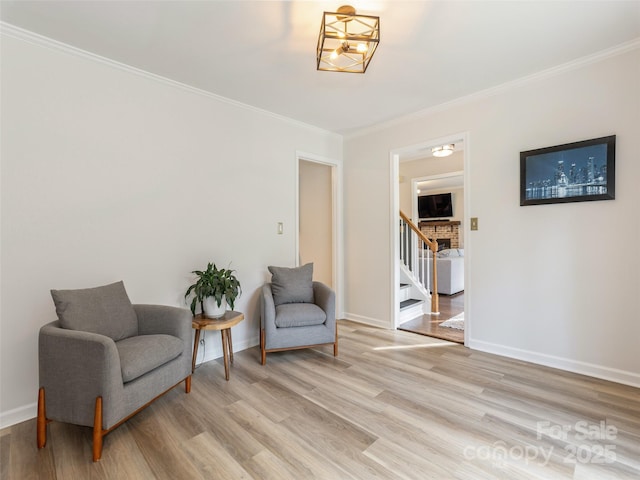 502 Windsor Forest Ct, Fletcher, NC 28732 - living area featuring light wood-style floors, ornamental molding, and stairway
