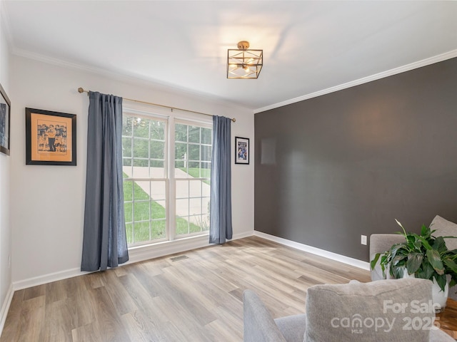 502 Windsor Forest Ct, Fletcher, NC 28732 - sitting room featuring wood finished floors, ornamental molding, and a chandelier