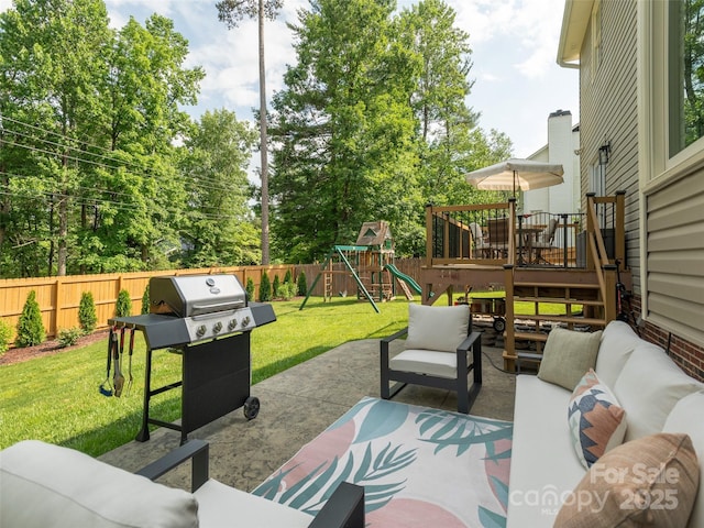 502 Windsor Forest Ct, Fletcher, NC 28732 - fenced backyard with an outdoor living space, grilling area, a playground, a patio area, and a deck