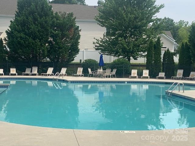 448 River Park Rd, Belmont, NC 28012 - community pool featuring a patio
