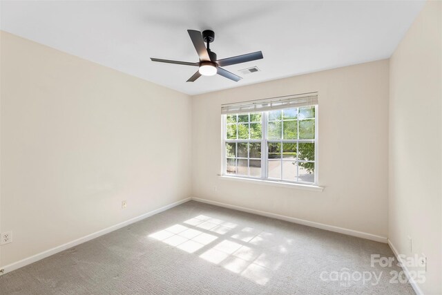 448 River Park Rd, Belmont, NC 28012 - carpeted spare room featuring baseboards and a ceiling fan
