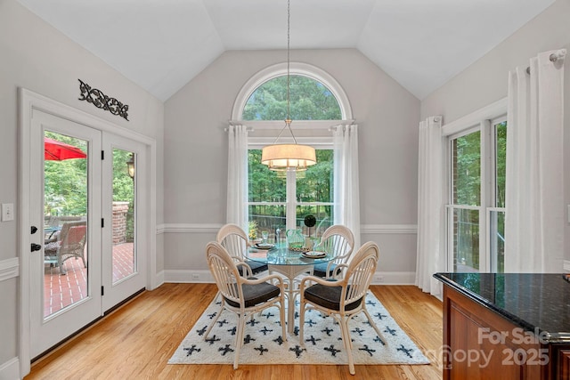 1317 Longleaf Ct, Matthews, NC 28104 - dining space featuring plenty of natural light, light wood-type flooring, and lofted ceiling