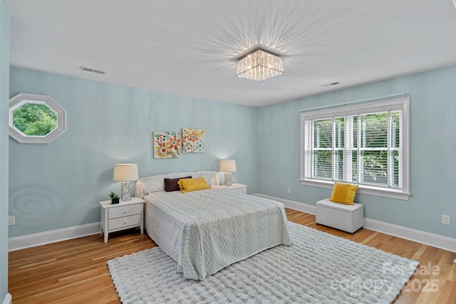 1317 Longleaf Ct, Matthews, NC 28104 - bedroom with baseboards and wood finished floors
