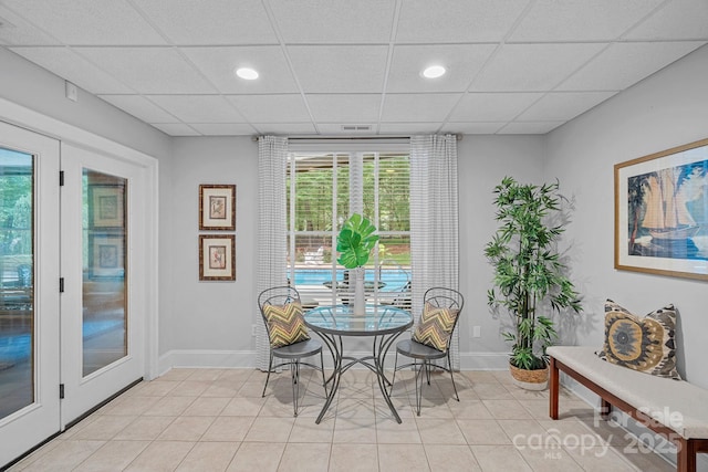 1317 Longleaf Ct, Matthews, NC 28104 - dining room featuring light tile patterned floors, a drop ceiling, and recessed lighting