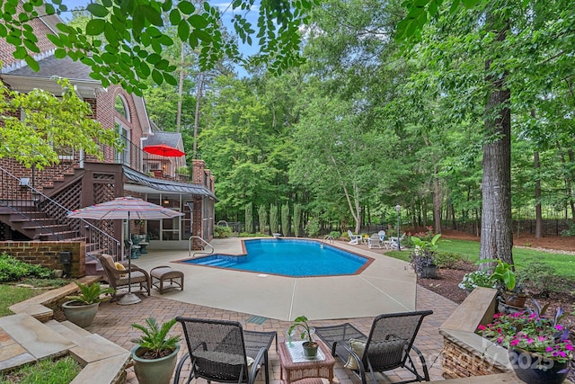 1317 Longleaf Ct, Matthews, NC 28104 - view of pool with a patio area, stairway, and a sunroom