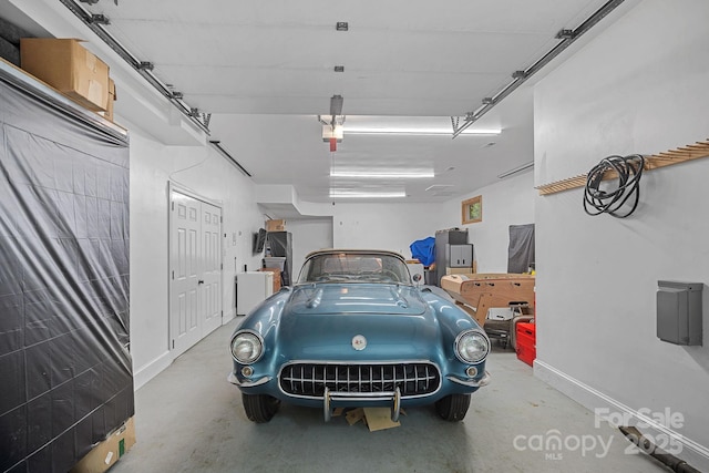 1317 Longleaf Ct, Matthews, NC 28104 - garage with baseboards