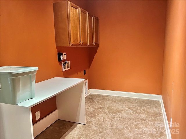 1302 Devonmere Pl, Salisbury, NC 28144 - laundry area featuring cabinet space, hookup for a washing machine, and tile patterned floors