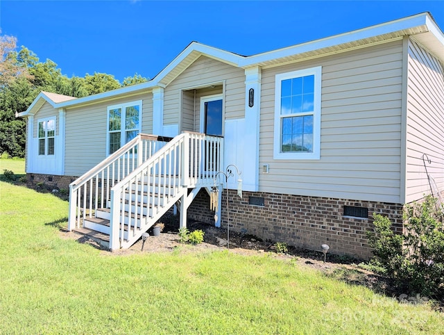4713 White Store Rd, Wingate, NC 28174 - manufactured / mobile home featuring crawl space and a front yard