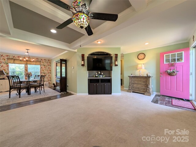 4713 White Store Rd, Wingate, NC 28174 - carpeted living room with ornamental molding, a ceiling fan, a chandelier, recessed lighting, and beamed ceiling