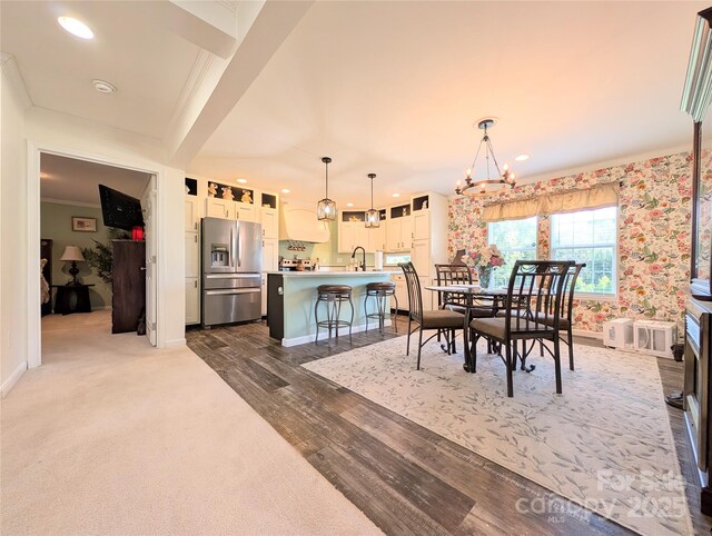 4713 White Store Rd, Wingate, NC 28174 - dining space featuring ornamental molding, a chandelier, dark wood-type flooring, and recessed lighting