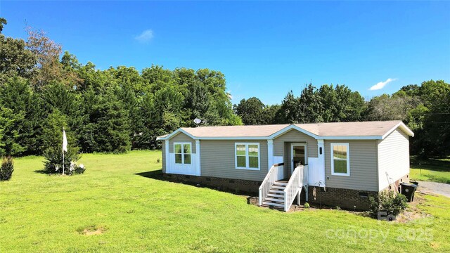 4713 White Store Rd, Wingate, NC 28174 - manufactured / mobile home with crawl space and a front lawn