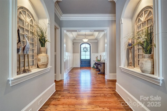 6216 N Rd, York, SC 29745 - entrance foyer featuring wood finished floors, crown molding, a wainscoted wall, and a decorative wall