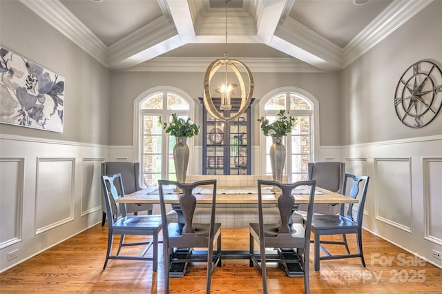 6216 N Rd, York, SC 29745 - dining room featuring wainscoting, a decorative wall, a chandelier, crown molding, and wood finished floors