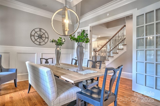 6216 N Rd, York, SC 29745 - dining area featuring stairway, wood finished floors, ornamental molding, wainscoting, and a decorative wall