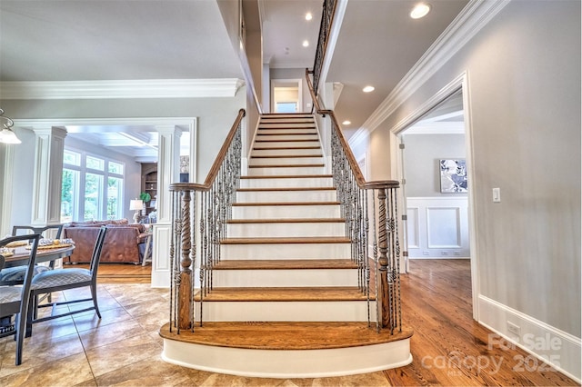6216 N Rd, York, SC 29745 - stairs with ornamental molding, a decorative wall, decorative columns, recessed lighting, and wainscoting