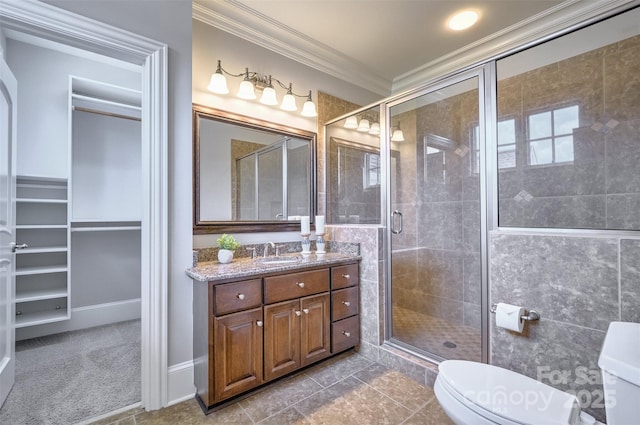 6216 N Rd, York, SC 29745 - full bathroom with crown molding, vanity, a shower stall, tile patterned flooring, and a spacious closet