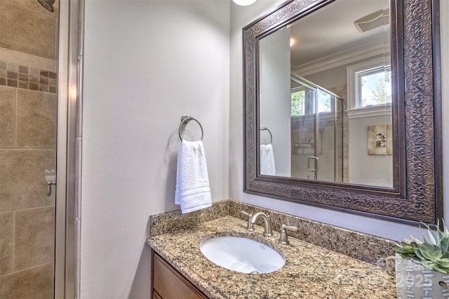 6216 N Rd, York, SC 29745 - bathroom with vanity, a shower stall, and ornamental molding